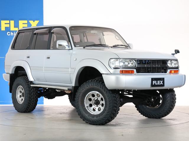 ランドクルーザー８０ 　下取り車　ハイリフト　後期型　新品ジオＭＴタイヤ　社外１６インチＡＷ　カロッツェリア製７インチナビ　ＥＴＣ　ウッドシフトノブ　ウッドステアリング　新品フロントグリル　新品３色テールランプ　サンルーフ（20枚目）