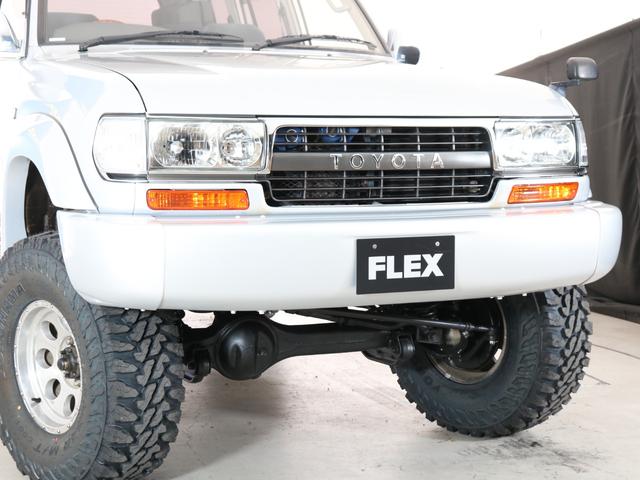 ランドクルーザー８０ 　下取り車　ハイリフト　後期型　新品ジオＭＴタイヤ　社外１６インチＡＷ　カロッツェリア製７インチナビ　ＥＴＣ　ウッドシフトノブ　ウッドステアリング　新品フロントグリル　新品３色テールランプ　サンルーフ（24枚目）