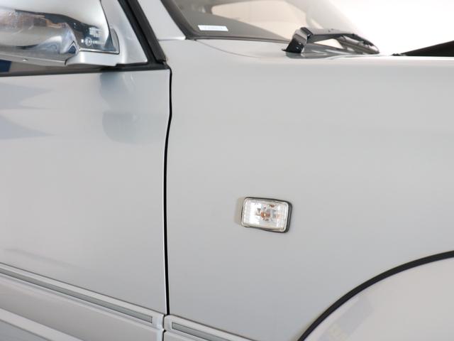 ランドクルーザー８０ 　下取り車　ハイリフト　後期型　新品ジオＭＴタイヤ　社外１６インチＡＷ　カロッツェリア製７インチナビ　ＥＴＣ　ウッドシフトノブ　ウッドステアリング　新品フロントグリル　新品３色テールランプ　サンルーフ（28枚目）