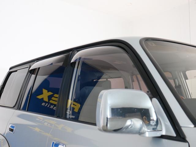 ランドクルーザー８０ 　下取り車　ハイリフト　後期型　新品ジオＭＴタイヤ　社外１６インチＡＷ　カロッツェリア製７インチナビ　ＥＴＣ　ウッドシフトノブ　ウッドステアリング　新品フロントグリル　新品３色テールランプ　サンルーフ（32枚目）