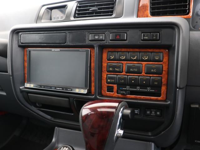 ランドクルーザー８０ 　下取り車　ハイリフト　後期型　新品ジオＭＴタイヤ　社外１６インチＡＷ　カロッツェリア製７インチナビ　ＥＴＣ　ウッドシフトノブ　ウッドステアリング　新品フロントグリル　新品３色テールランプ　サンルーフ（41枚目）