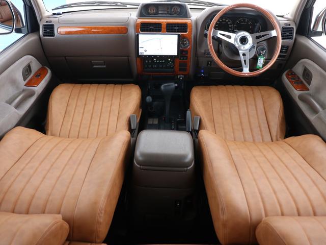 ランドクルーザープラド ＴＸリミテッド　新品ＤＥＡＮカルフォルニア　新品オープンカントリー　ＭＴ新品カロッツェリア製フローティングナビ　新品ウッドステアリング　新品クラシックシートカバー　新品フロアマットバックカメラ　ＥＴＣ（9枚目）
