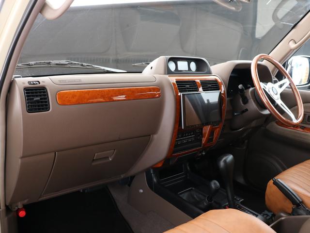 ランドクルーザープラド ＴＸリミテッド　新品ＤＥＡＮカルフォルニア　新品オープンカントリー　ＭＴ新品カロッツェリア製フローティングナビ　新品ウッドステアリング　新品クラシックシートカバー　新品フロアマットバックカメラ　ＥＴＣ（60枚目）