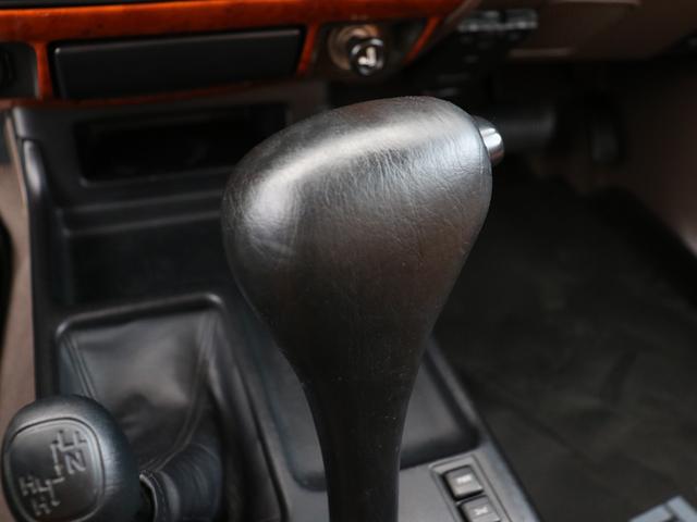 ランドクルーザープラド ＴＸリミテッド　新品ＤＥＡＮカルフォルニア　新品オープンカントリー　ＭＴ新品カロッツェリア製フローティングナビ　新品ウッドステアリング　新品クラシックシートカバー　新品フロアマットバックカメラ　ＥＴＣ（65枚目）