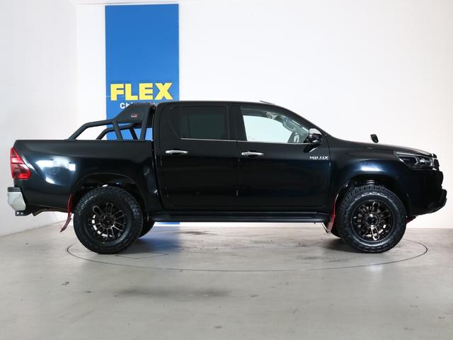 ハイラックス Z ワンオーナー 買取車両 Zグレードブラックカラー BATTLEZリフトアップ XELF・AW ジオランダーX-ATタイヤ GRスポーツバー GRマッドフラップ GRフロントアンダーカバー(12枚目)