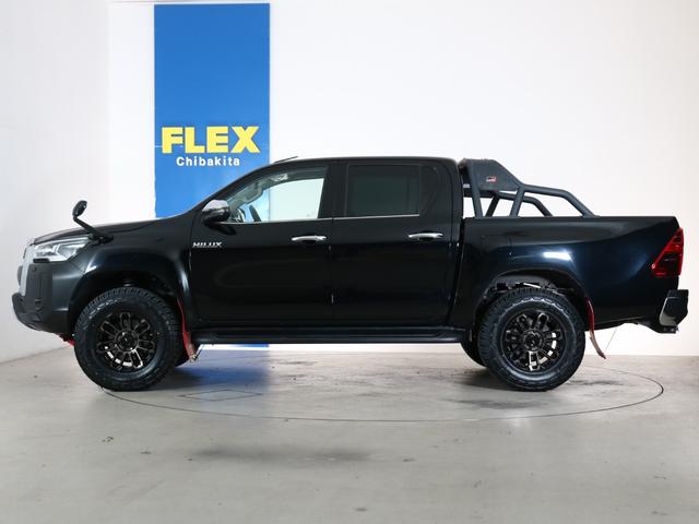 ハイラックス Z ワンオーナー 買取車両 Zグレードブラックカラー BATTLEZリフトアップ XELF・AW ジオランダーX-ATタイヤ GRスポーツバー GRマッドフラップ GRフロントアンダーカバー(17枚目)