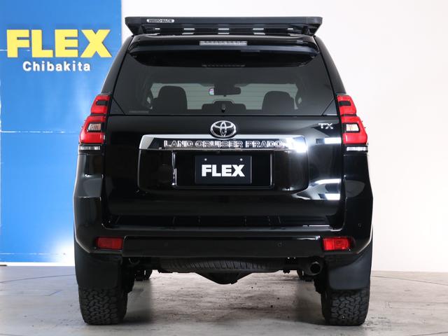 ランドクルーザープラド ＴＸ　１オーナー車　２インチＵＰ　ＮＩＴＲＯ１７インチＡＷ　ＢＦＧ・Ａ／Ｔタイヤ　ＲＨＩＮＯ－ＲＡＣＫ＆バックボーンシステム　サンルーフ　寒冷地仕様　カロッツェリア９インチナビ　フリップダウンモニター（23枚目）