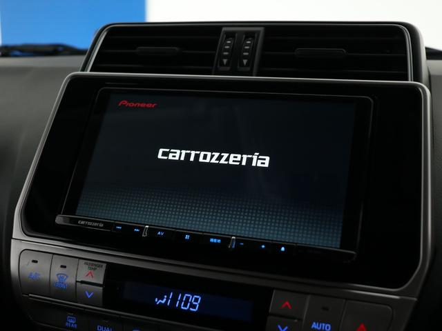 ランドクルーザープラド ＴＸ　１オーナー車　２インチＵＰ　ＮＩＴＲＯ１７インチＡＷ　ＢＦＧ・Ａ／Ｔタイヤ　ＲＨＩＮＯ－ＲＡＣＫ＆バックボーンシステム　サンルーフ　寒冷地仕様　カロッツェリア９インチナビ　フリップダウンモニター（46枚目）