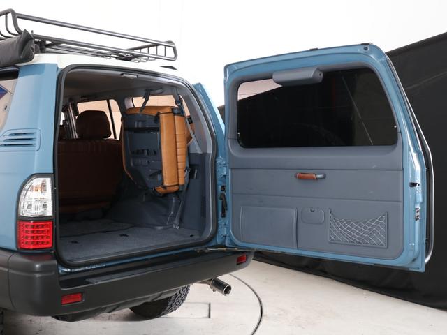 ランドクルーザープラド ＴＸリミテッド　丸目フェイス＆ナローボディー化　ＹＡＫＩＭＡラック　リアラダー　ＫＩＮＧＳサイドオーニング　アンティーク調シートカバー　ナルディーステア　カロッツェリアＳＤナビ　バックカメラ　フリップダウンモニター（42枚目）