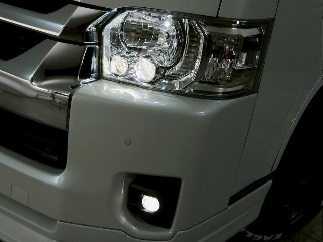 ハイエースワゴン GL 10人乗り3ナンバー登録 ガソリン4WD スタンダードPKG 17インチアルミホイール メモリーナビ 後席モニター ETC パワースライドドア カーゴマット 黒革調シートカバー(10枚目)
