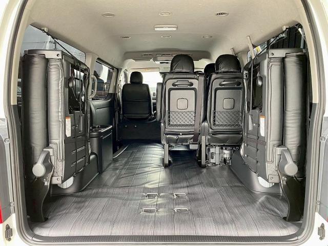 ハイエースワゴン GL 10人乗り3ナンバー登録 ガソリン4WD スタンダードPKG 17インチアルミホイール メモリーナビ 後席モニター ETC パワースライドドア カーゴマット 黒革調シートカバー(21枚目)