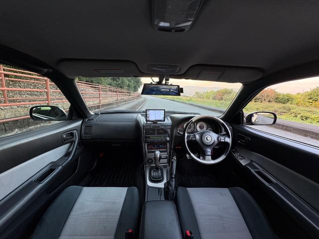 スカイライン 25GT-Vクーペ■後期型■TEIN車高調■RAYS17AW ■修復歴無し■HIDヘッドライト■ドライブレコーダー前/後■キーレス■オートエアコン■社外ナビ■CDデッキ■コンビハンドル■ETC(3枚目)