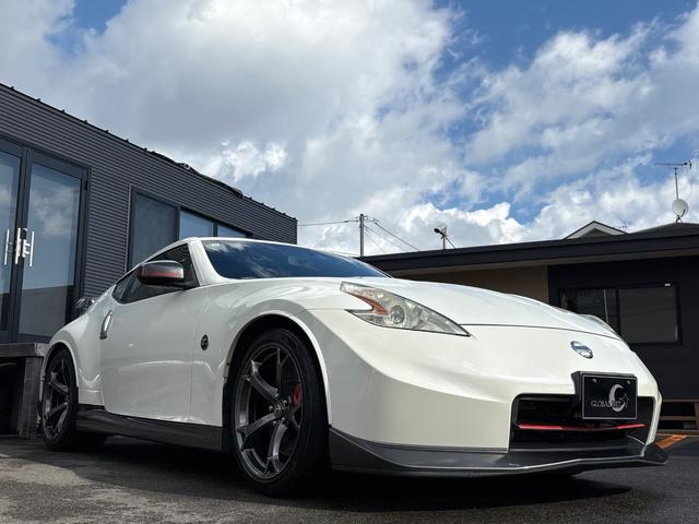 フェアレディZ ニスモ■ワンオーナー車■スポーツリセッティング実施済み ■ニスモフロントバンパー■ニスモ2本出しマフラー■ニスモハーフレザー■純正19インチ■HIDヘッド■メーカー純正ナビ■バックカメラ■CD■DVD■Bluetooth■USB■ETC(25枚目)