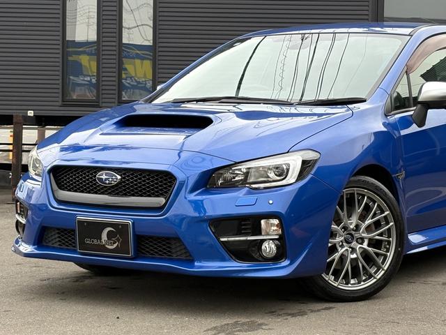 ＷＲＸ　Ｓ４のワンオーナー車が入庫しました！人気のブールーパールボディにオプション大型リアウィングを装備！更に純正オプション１８インチアルミやビルシュタイン製ダンパー、ＬＥＤヘッドなどなど装備済み