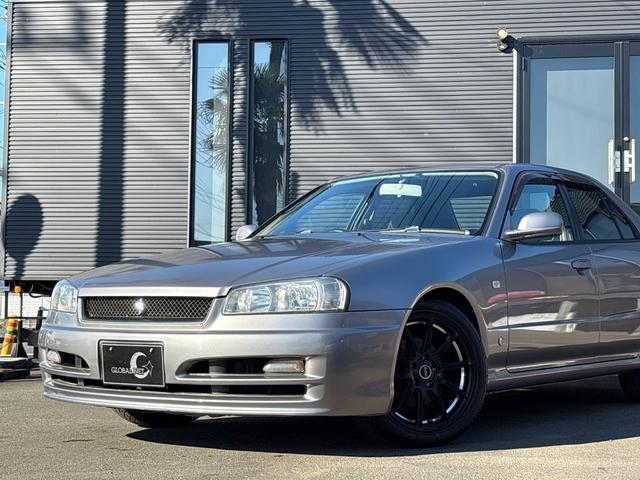 スカイライン 25GT-X■後期型■修復歴なし■純正リアスポイラー ■RB25エンジン■社外17インチアルミ■テイン【フルタップ式】車高調■オートエアコン■ETC■キーレス■フィルムガラス■CD■シフトチェンジスイッチ(2枚目)