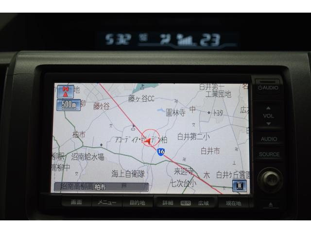 ステップワゴン Ｇ　Ｌパッケージ　地デジナビ　バックカメラ　後席モニター　フルフラット　ＭＴタイヤ　ルーフラック　ＥＴＣ　ＨＩＤ　オートライト　オートエアコン　ブラックアウトホイール　フローリングフロア　両側パワースライドドア（12枚目）