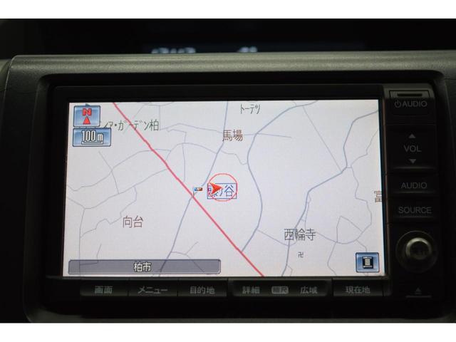 ステップワゴンスパーダ Ｚ　地デジナビ　バックカメラ　オートエアコン　マニュアルモード　フルフラットシート　ＥＴＣ　スマートキー　ＨＩＤ　オートライト　横滑り防止機能　フォグランプ　両側パワースライドドア（12枚目）