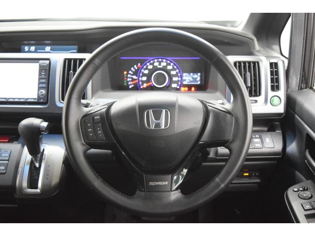 ステップワゴンスパーダ Ｚ　地デジナビ　バックカメラ　オートエアコン　マニュアルモード　フルフラットシート　ＥＴＣ　スマートキー　ＨＩＤ　オートライト　横滑り防止機能　フォグランプ　両側パワースライドドア（31枚目）