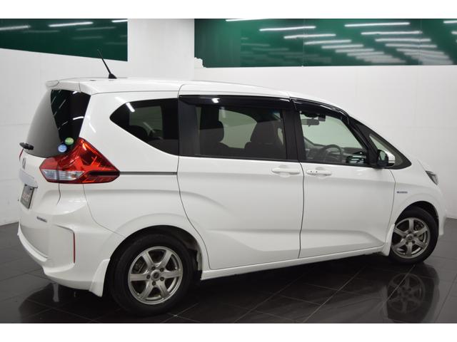 フリードハイブリッド ハイブリッド・Gホンダセンシング 衝突軽減システム バックカメラ アダプティブクルーズコントロール レーンアシスト スマートキー アイドリングストップ オートエアコン スマートキー オートエアコン 両側パワースライドドア(10枚目)