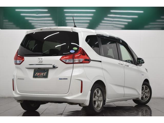 フリードハイブリッド ハイブリッド・Gホンダセンシング 衝突軽減システム バックカメラ アダプティブクルーズコントロール レーンアシスト スマートキー アイドリングストップ オートエアコン スマートキー オートエアコン 両側パワースライドドア(20枚目)