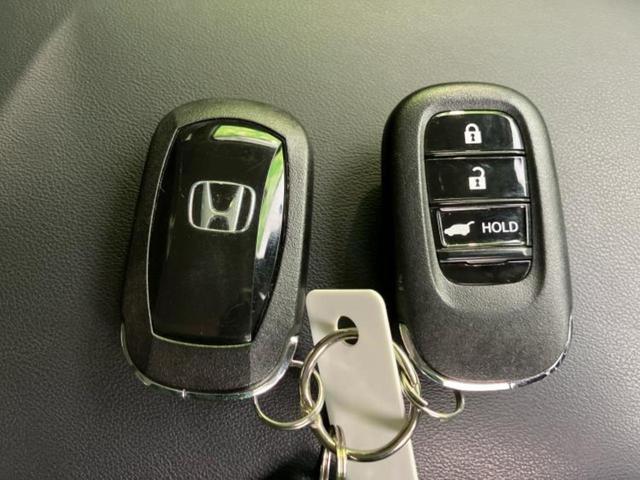 ヴェゼル eHEV Z 保証書/純正 9インチ SDナビ/衝突安全装置/シートヒーター/車線逸脱防止支援システム/シート ハーフレザー/電動バックドア/ヘッドランプ LED/ETC/EBD付ABS/横滑り防止装置 記録簿(42枚目)