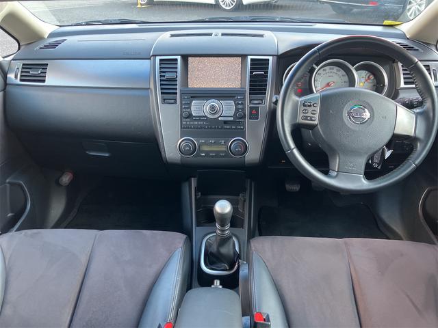 ティーダ １８Ｇ　ＥＴＣ　ナビ　オートライト　ＨＩＤ　スマートキー　電動格納ミラー　ＭＴ　盗難防止システム　衝突安全ボディ　ＡＢＳ　ＣＤ　ＤＶＤ再生　ミュージックプレイヤー接続可　Ｂｌｕｅｔｏｏｔｈ　エアコン（2枚目）