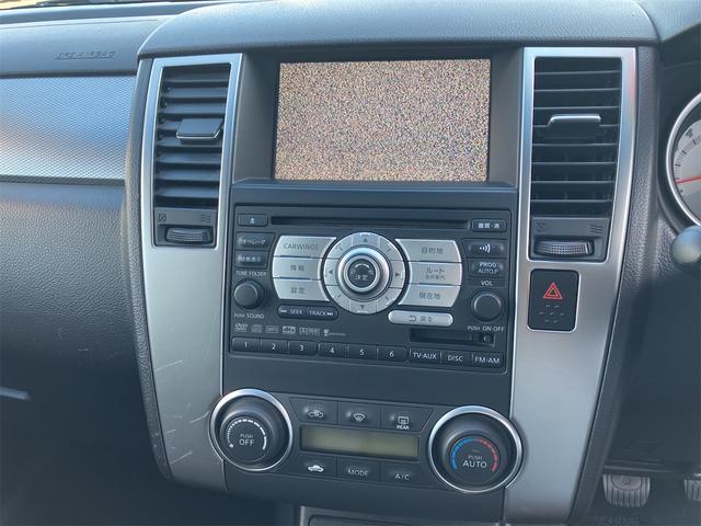 ティーダ １８Ｇ　ＥＴＣ　ナビ　オートライト　ＨＩＤ　スマートキー　電動格納ミラー　ＭＴ　盗難防止システム　衝突安全ボディ　ＡＢＳ　ＣＤ　ＤＶＤ再生　ミュージックプレイヤー接続可　Ｂｌｕｅｔｏｏｔｈ　エアコン（4枚目）