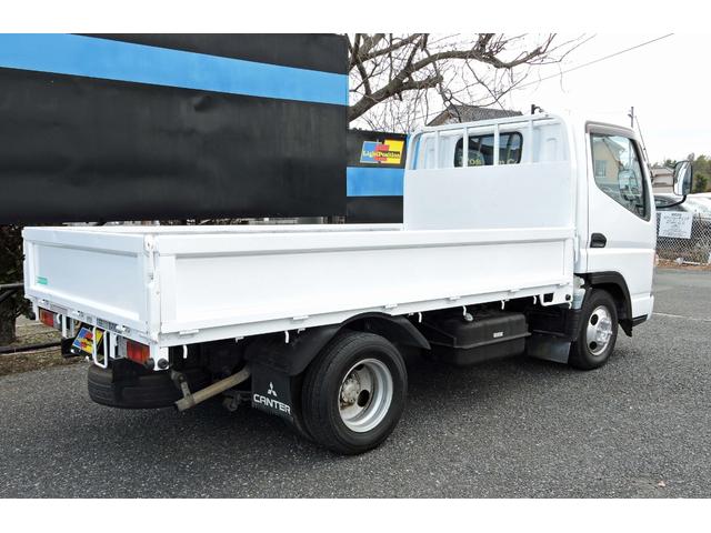 キャンターガッツ ロング全低床ＤＸ　５ＭＴ　載積１．５ｔ　ディーゼル　平ボディ　パワーウィンドウ（4枚目）