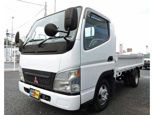 キャンターガッツ ロング全低床ＤＸ　５ＭＴ　載積１．５ｔ　ディーゼル　平ボディ　パワーウィンドウ（7枚目）