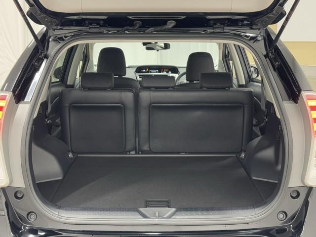 プリウスアルファ G TSS Bモニタ 電動シート 盗難防止装置 AUX エアバッグ ABS 地デジTV Aストップ オートクルーズコントロール ETC付 Wエアバック TVナビ DVD再生機能 キーフリーキー AW(16枚目)