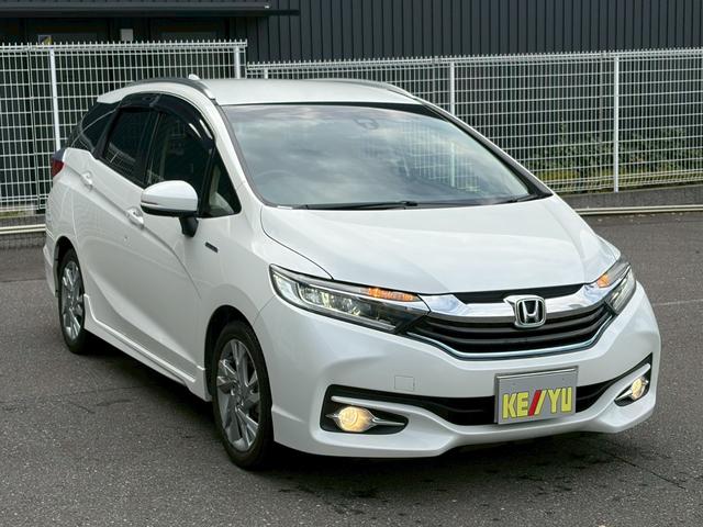 シャトル ハイブリッドＺ　シティブレーキ　ルーフレール　禁煙　インターナビ　フルセグＴＶ　Ｂｌｕｅｔｏｏｔｈ　ＨＤＭＩ　バックカメラ　ＥＴＣ　クルコン　ヒーター付ハーフレザーシート　ＬＥＤヘッドライト　フォグ　オートライト　純正アルミ　リアスポイラー（6枚目）