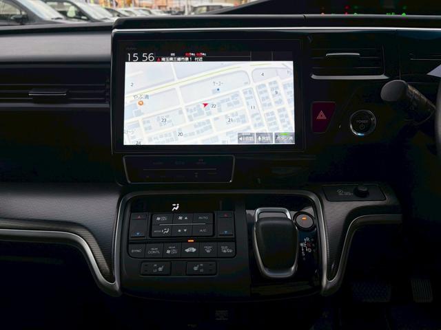 ステップワゴンスパーダ ｅ：ＨＥＶスパーダ　Ｇ・ＥＸ　ホンダセンシング　禁煙　ブラックスタイル　１０インチメモリーナビ　１１．６インチ後席モニター　マルチビューカメラ　フルセグＴＶ　Ｂｌｕｅｔｏｏｔｈ　ＥＴＣ２．０　追従型クルコン　ヒーター付ハーフレザーシート　純正アルミ（23枚目）