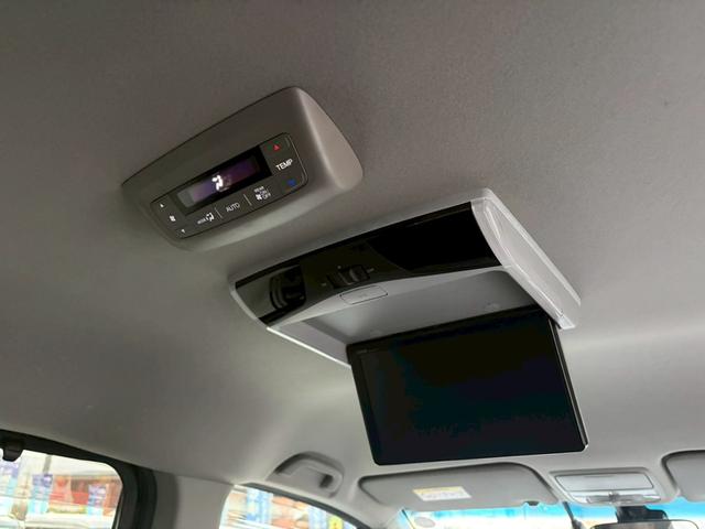 ステップワゴンスパーダ ｅ：ＨＥＶスパーダ　Ｇ・ＥＸ　ホンダセンシング　禁煙　ブラックスタイル　１０インチメモリーナビ　１１．６インチ後席モニター　マルチビューカメラ　フルセグＴＶ　Ｂｌｕｅｔｏｏｔｈ　ＥＴＣ２．０　追従型クルコン　ヒーター付ハーフレザーシート　純正アルミ（27枚目）