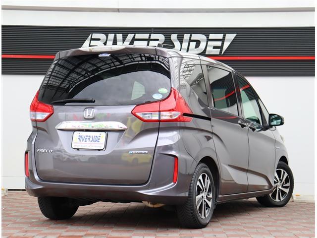 フリードハイブリッド ハイブリッド・Ｇホンダセンシング　純正９インチメモリーナビフルセグバックカメラスマートキーエアロバンパー純正１５インチアルミＬＥＤヘッドライト＆フォグ両側電動スライドステアリモコンレーダークルコンハーフレザーシートホンダセンシング（6枚目）