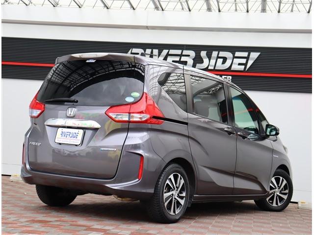 フリードハイブリッド ハイブリッド・Ｇホンダセンシング　純正９インチメモリーナビフルセグバックカメラスマートキーエアロバンパー純正１５インチアルミＬＥＤヘッドライト＆フォグ両側電動スライドステアリモコンレーダークルコンハーフレザーシートホンダセンシング（27枚目）