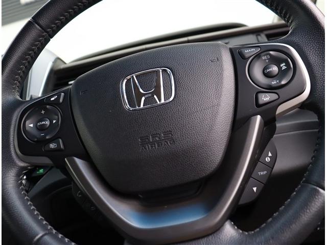 フリードハイブリッド ハイブリッド・Ｇホンダセンシング　純正９インチメモリーナビフルセグバックカメラスマートキーエアロバンパー純正１５インチアルミＬＥＤヘッドライト＆フォグ両側電動スライドステアリモコンレーダークルコンハーフレザーシートホンダセンシング（34枚目）