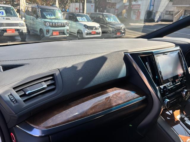 ヴェルファイアハイブリッド エグゼクティブラウンジ　１オーナー禁煙車　純正９型ナビ　ツインムーンルーフ　全方位モニター　１２．１型フリップダウンモニター　ＢＯＳＥサウンド　ドラレコ　ＥＴＣ２．０　モデリスタエアロ　両側パワスラ　純正ＡＷ１７インチ（23枚目）