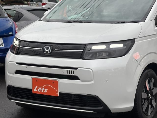 フリード ｅ：ＨＥＶエアー　ＥＸ　登録済未使用車　３列６人　ホンダセンシング　１１．４インチナビ２４７ＶＦＬＩ　全方位モニタ　ナビ連動ＥＴＣ２．０　前後ドラレコＤＲＣ２ＣＡＭセット　両側パワスラ　フレッシュキーパー施工済　新車保証継承（34枚目）