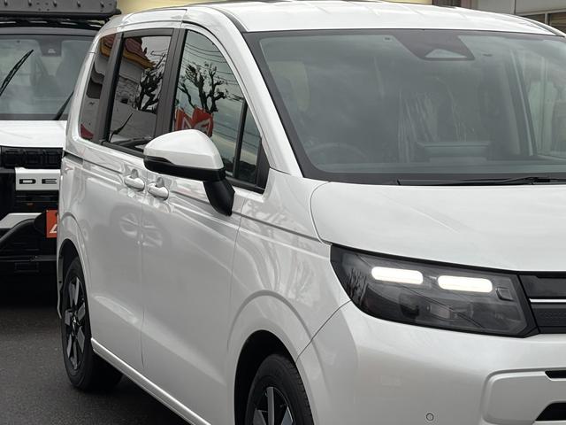 フリード ｅ：ＨＥＶエアー　ＥＸ　登録済未使用車　３列６人　ホンダセンシング　１１．４インチナビ２４７ＶＦＬＩ　全方位モニタ　ナビ連動ＥＴＣ２．０　前後ドラレコＤＲＣ２ＣＡＭセット　両側パワスラ　フレッシュキーパー施工済　新車保証継承（36枚目）