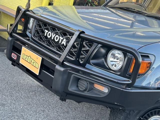 ランドクルーザー100 VXリミテッド 丸目フェイス換装 ARBバンパー オールペイントブルーグレー サイドモールレス(5枚目)