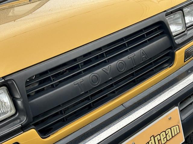 ランドクルーザー80 VXリミテッド 角目4灯フェイス ワイドボディーブラックオーバーフェンダー リフトアップ 背面レス仕様 イエローボディー サンルーフ マフラー(7枚目)