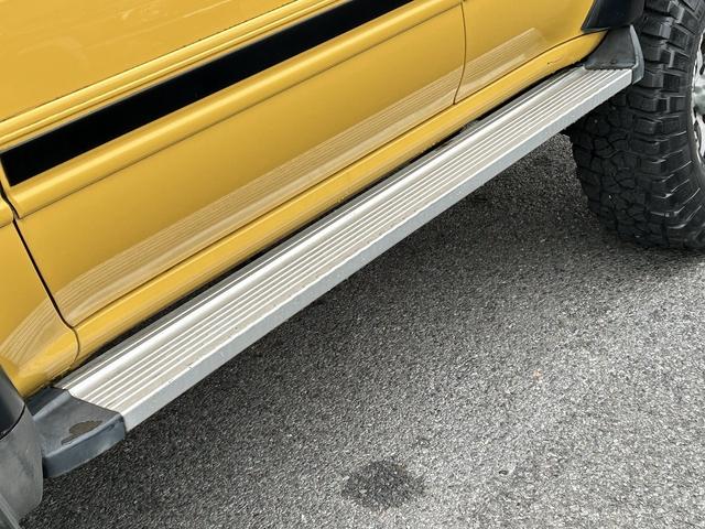 ランドクルーザー80 VXリミテッド 角目4灯フェイス ワイドボディーブラックオーバーフェンダー リフトアップ 背面レス仕様 イエローボディー サンルーフ マフラー(10枚目)