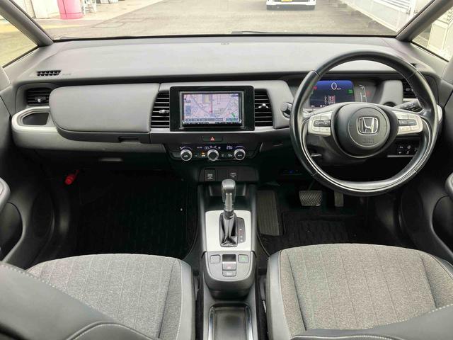 フィット e:HEVホーム ナビゲーション ETC車載器 保証 まごころ保証 1年間・走行距離無制限付き ナビゲーション ETC車載器 パワーウインドウ キーフリーシステム 電動格納ドアミラー 電動パーキングブレーキ クルーズコントロール(5枚目)