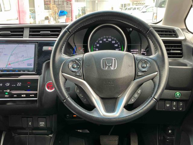 フィットハイブリッド L ホンダセンシング ナビゲーション ETC車載器 保証 まごころ保証 1年間・走行距離無制限付き ナビゲーション ETC車載器 バックカメラ 電動格納ドアミラー オートエアコン クルーズコントロール キーフリーシステム 電動パーキングブレーキ(4枚目)