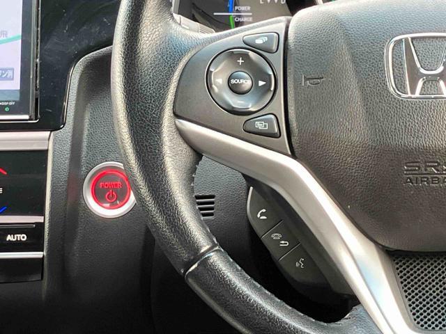 フィットハイブリッド L ホンダセンシング ナビゲーション ETC車載器 保証 まごころ保証 1年間・走行距離無制限付き ナビゲーション ETC車載器 バックカメラ 電動格納ドアミラー オートエアコン クルーズコントロール キーフリーシステム 電動パーキングブレーキ(9枚目)