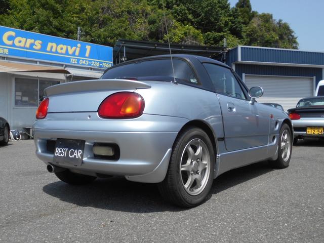 カプチーノ ベースグレード　最終型　５速マニュアル　ツインカムターボ　ノーマル車　４ＷＡＹオープンカー　純正リアウイング　後期型専用１４インチアルミ　ＣＤオーディオ　ＥＴＣ付　収納ネット　ルーフ収納カバー付き（4枚目）