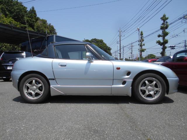 カプチーノ ベースグレード　最終型　５速マニュアル　ツインカムターボ　ノーマル車　４ＷＡＹオープンカー　純正リアウイング　後期型専用１４インチアルミ　ＣＤオーディオ　ＥＴＣ付　収納ネット　ルーフ収納カバー付き（6枚目）