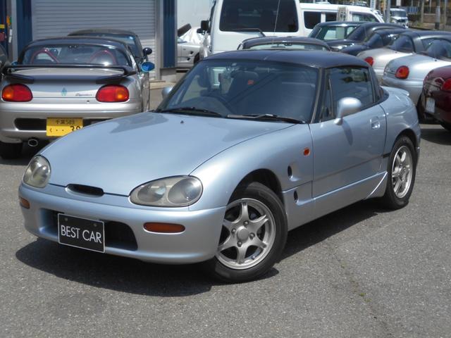 カプチーノ ベースグレード　最終型　５速マニュアル　ツインカムターボ　ノーマル車　４ＷＡＹオープンカー　純正リアウイング　後期型専用１４インチアルミ　ＣＤオーディオ　ＥＴＣ付　収納ネット　ルーフ収納カバー付き（7枚目）