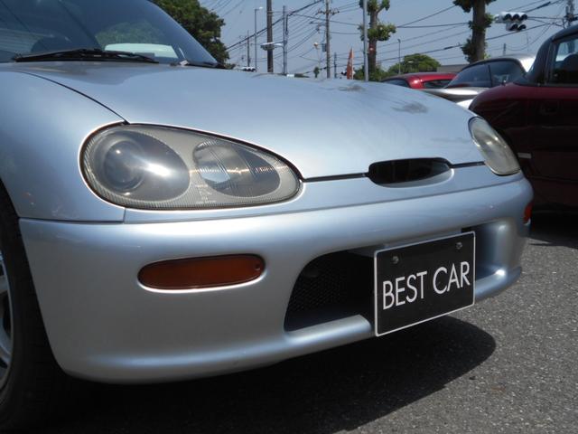カプチーノ ベースグレード　最終型　５速マニュアル　ツインカムターボ　ノーマル車　４ＷＡＹオープンカー　純正リアウイング　後期型専用１４インチアルミ　ＣＤオーディオ　ＥＴＣ付　収納ネット　ルーフ収納カバー付き（25枚目）