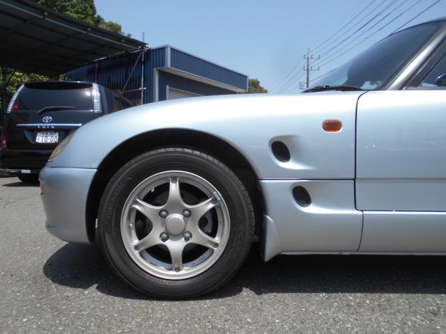 カプチーノ ベースグレード　最終型　５速マニュアル　ツインカムターボ　ノーマル車　４ＷＡＹオープンカー　純正リアウイング　後期型専用１４インチアルミ　ＣＤオーディオ　ＥＴＣ付　収納ネット　ルーフ収納カバー付き（27枚目）